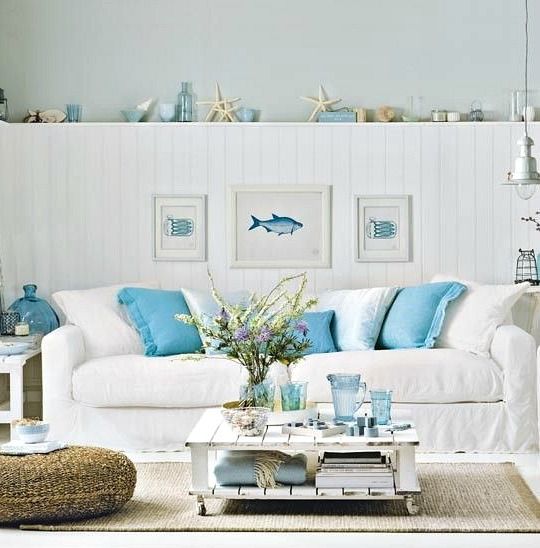 A Coastal Vibe with Shelves Behind Couch