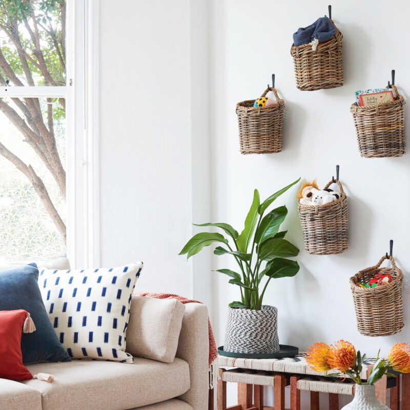 Baskets on The Shelves Behind the Couch