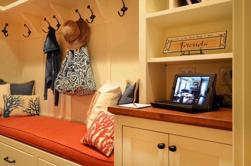 Beige Mudroom with Orange Painted Bench