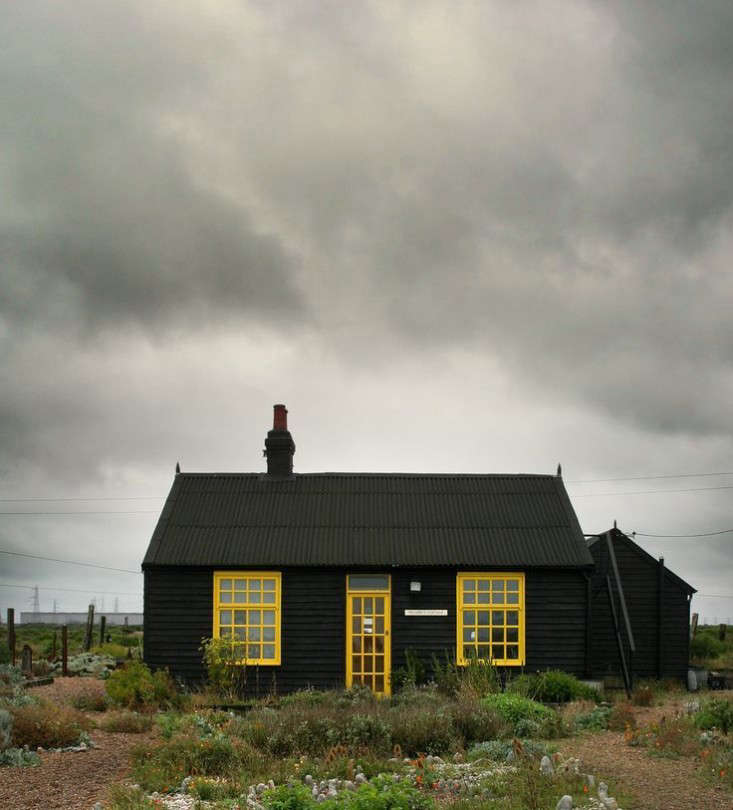 Black Farmhouse with Yellow Trim